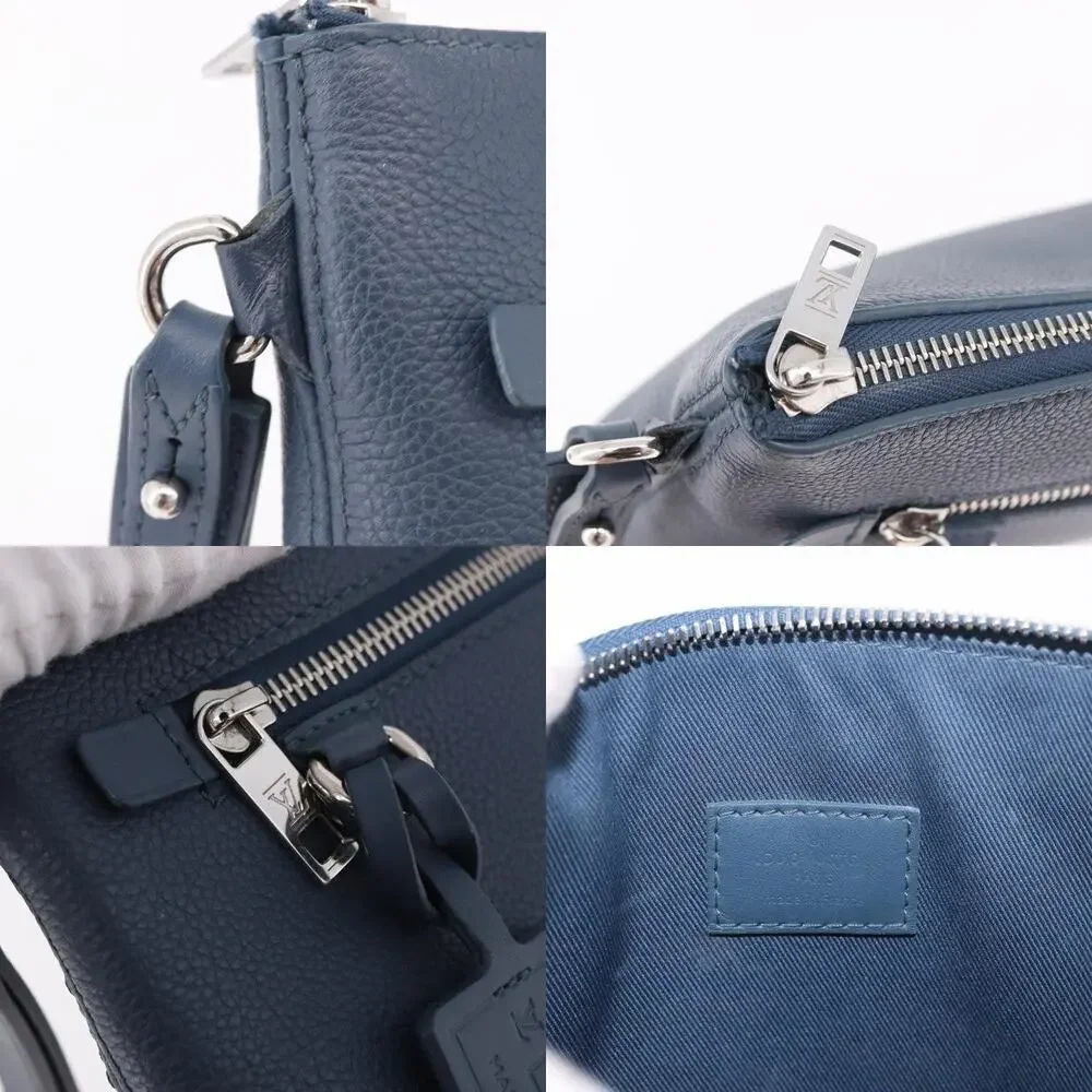 Louis Vuitton Leather Takeoff Pouch Blue